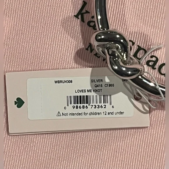 Kate Spade Silver Tone Loves Me Knot Cuff Bracelet NWT and dust bag - Picture 8 of 9